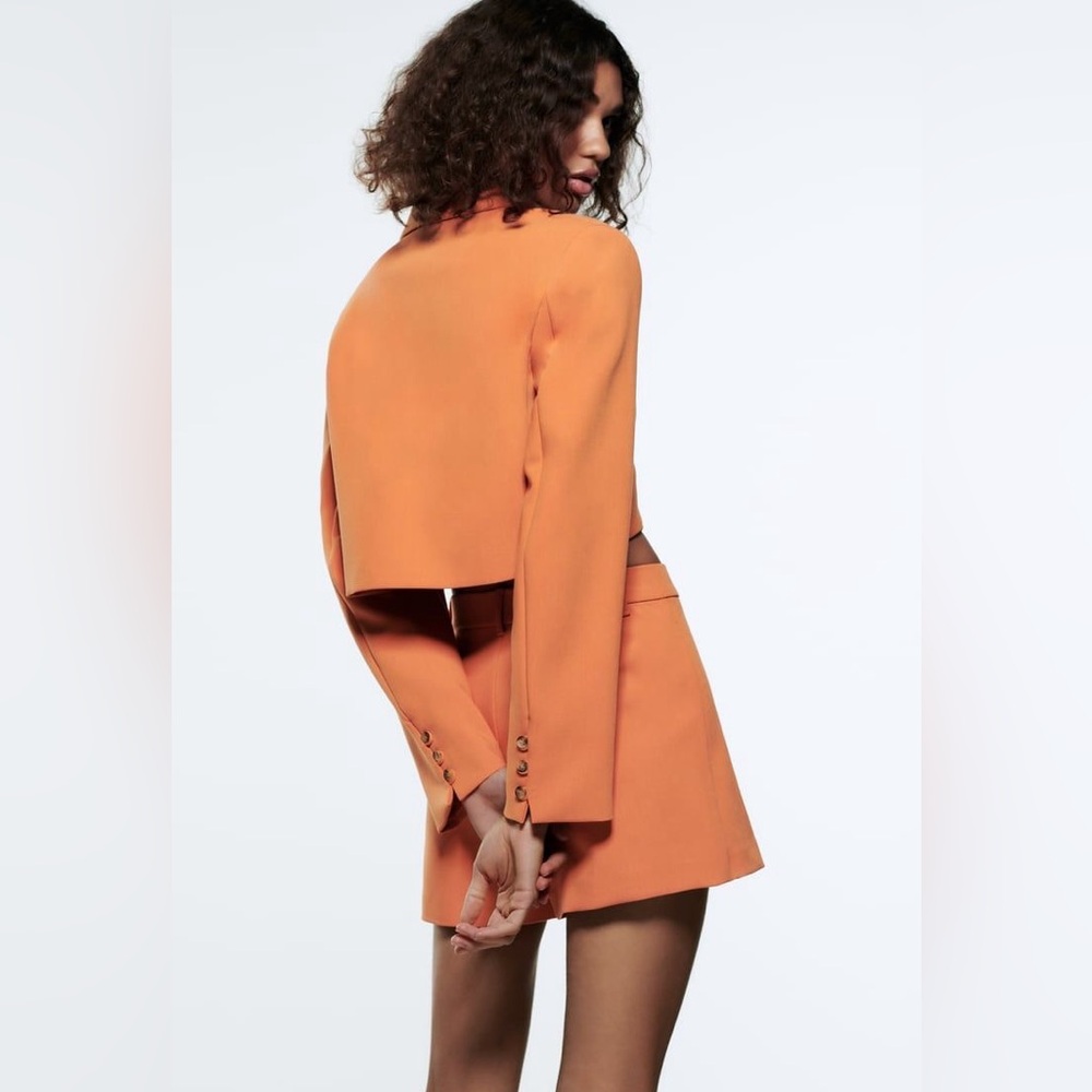 NWT.  Orange Cropped Blazer and Mini Skirt/Skort Set.